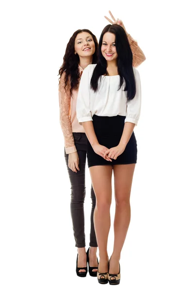 Two young standing women have fun — Stock Photo, Image