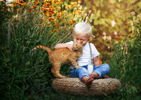 cute baby with ginger cat