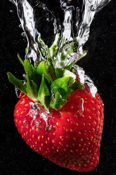 Éclaboussure de fraise Image En Vente