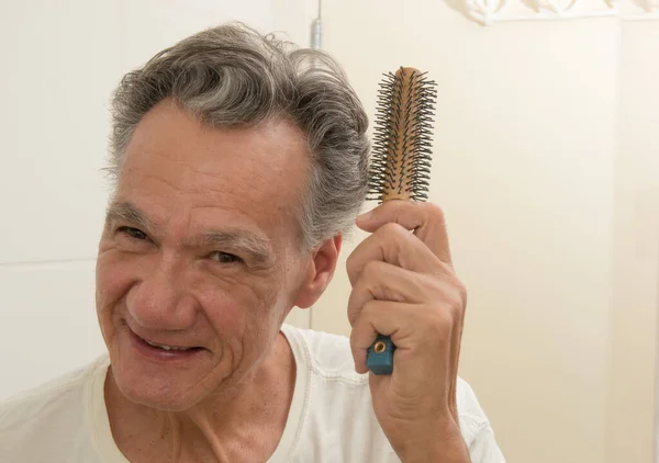 Mature Man Brushing Combing His Hair — Zdjęcie stockowe