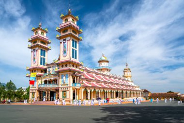 Tay Ninh, Vietnam - December 4th, 2021: Architecture outside holy temple was built in 1926, this is center of church tower officially a tourists to visit and admire in Tay Ninh, Vietnam