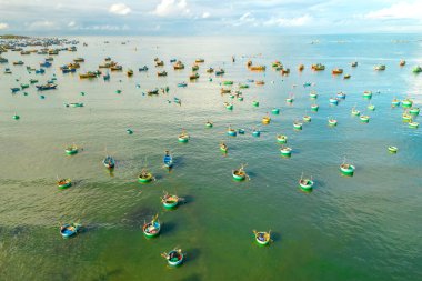 Mui Ne fishing village seen from above with hundreds of boats anchored to avoid storms, this is a beautiful bay in central Vietnam