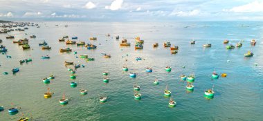 Mui Ne fishing village seen from above with hundreds of boats anchored to avoid storms, this is a beautiful bay in central Vietnam