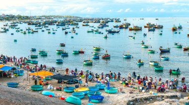 Mui Ne fish market seen from above, the morning market in a coastal fishing village to buy and sell seafood for the central provinces of Vietnam