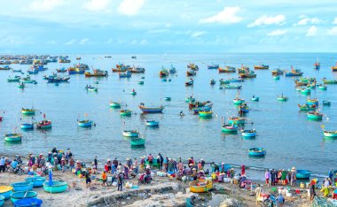 Mui Ne fish market seen from above, the morning market in a coastal fishing village to buy and sell seafood for the central provinces of Vietnam