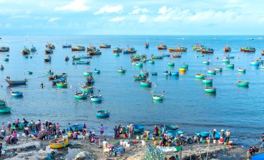 Mui Ne fish market seen from above, the morning market in a coastal fishing village to buy and sell seafood for the central provinces of Vietnam