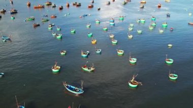 Mui Ne fishing village seen from above with hundreds of boats anchored to avoid storms, this is a beautiful bay in central Vietnam