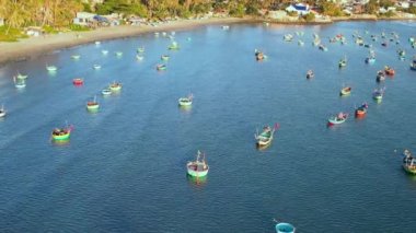 Mui Ne fishing village seen from above with hundreds of boats anchored to avoid storms, this is a beautiful bay in central Vietnam