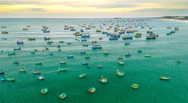 Mui Ne fishing village seen from above with hundreds of boats anchored to avoid storms, this is a beautiful bay in central Vietnam