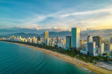 Nha Trang, Vietnam - July 4th, 2022: The coastal city of Nha Trang seen from above in the afternoon with its beautiful city and clean sandy beach attracts tourists to visit in Nha Trang, Vietnam
