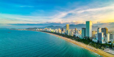 Nha Trang, Vietnam - July 4th, 2022: The coastal city of Nha Trang seen from above in the afternoon with its beautiful city and clean sandy beach attracts tourists to visit in Nha Trang, Vietnam
