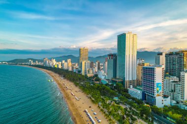 Nha Trang, Vietnam - July 4th, 2022: The coastal city of Nha Trang seen from above in the afternoon with its beautiful city and clean sandy beach attracts tourists to visit in Nha Trang, Vietnam
