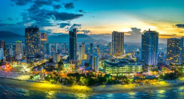 Nha Trang, Vietnam - July 4th, 2022: The coastal city of Nha Trang seen from above in the afternoon with its beautiful city and clean sandy beach attracts tourists to visit in Nha Trang, Vietnam