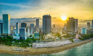 Nha Trang, Vietnam - July 4th, 2022: The coastal city of Nha Trang seen from above in the afternoon with its beautiful city and clean sandy beach attracts tourists to visit in Nha Trang, Vietnam