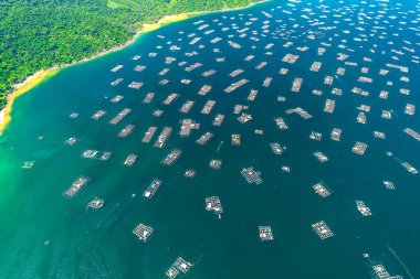 Vung Ro Bay seen from above includes fishing rafts, fishing boats, and fishermen's shelter from storms in central Vietnam.