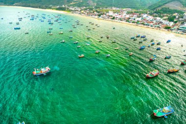 Dai Lanh fishing village seen from above with hundreds of boats anchored to avoid storms, this is a beautiful bay in Nha Trang, Vietnam