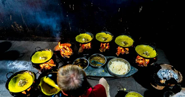 Vietnam food, banh xeo or vietnamese pancakes being fried under hot coals, they are made with rice flour and filled with a soya bean sprouts, is popular Viet Nam street food