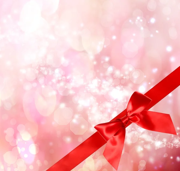 Red Bow and Ribbon with Bokeh Lights Royalty Free Stock Images