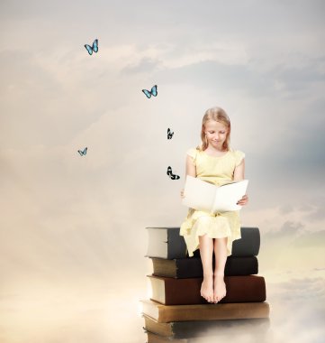 Little Blonde Girl Reading a Book clipart