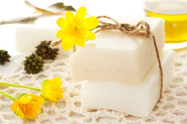 Bars of soap with yellow flowers
