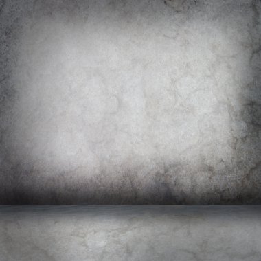 grijze betonnen wand en vloer