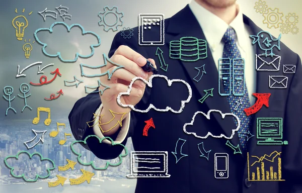 Uomo d'affari con immagini a tema cloud computing — Foto Stock