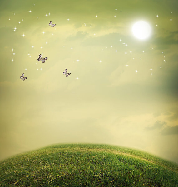 Летит в фантастическом пейзаже
