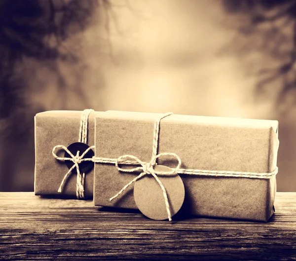 Cajas de regalo hechas a mano en tono sepia — Foto de Stock