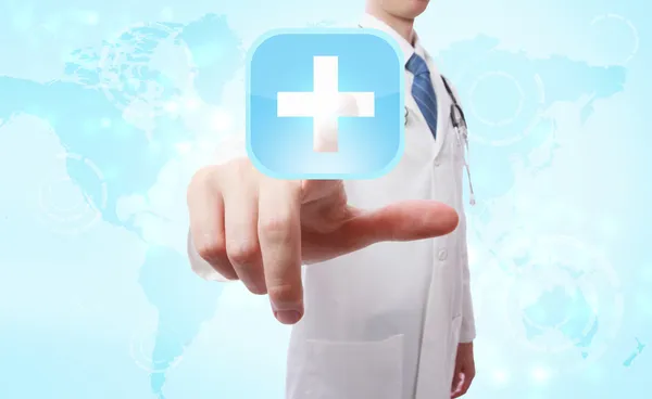 Médico médico empurrando ícone cruz azul — Fotografia de Stock