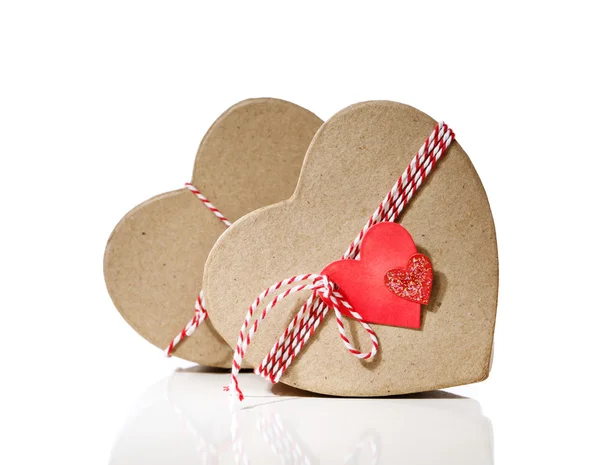Heart shaped gift boxes with heart tags — Stock Photo, Image