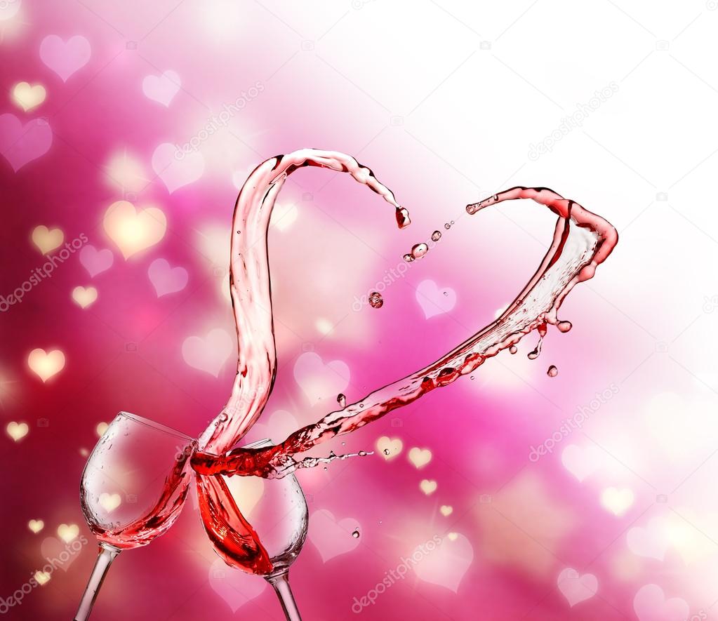 Heart splash from two glasses of red wine