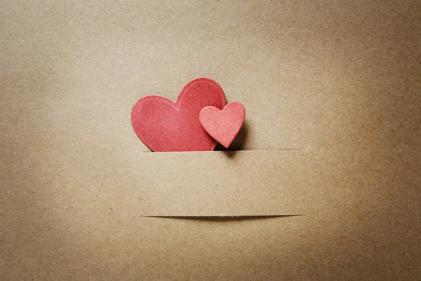 Small paper cut red hearts — Stock Photo, Image