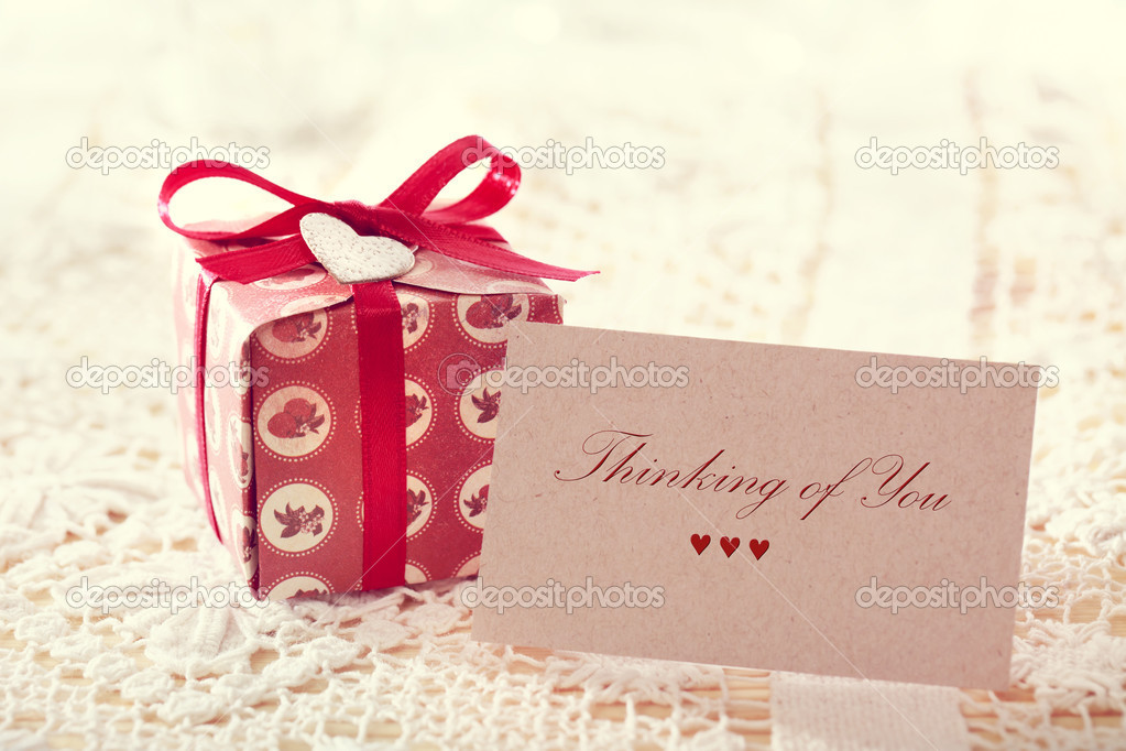 Thinking of you message with red present box 