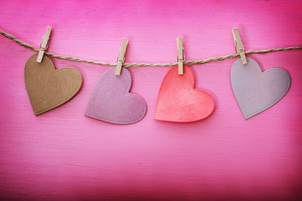 Paper hearts with clothespins