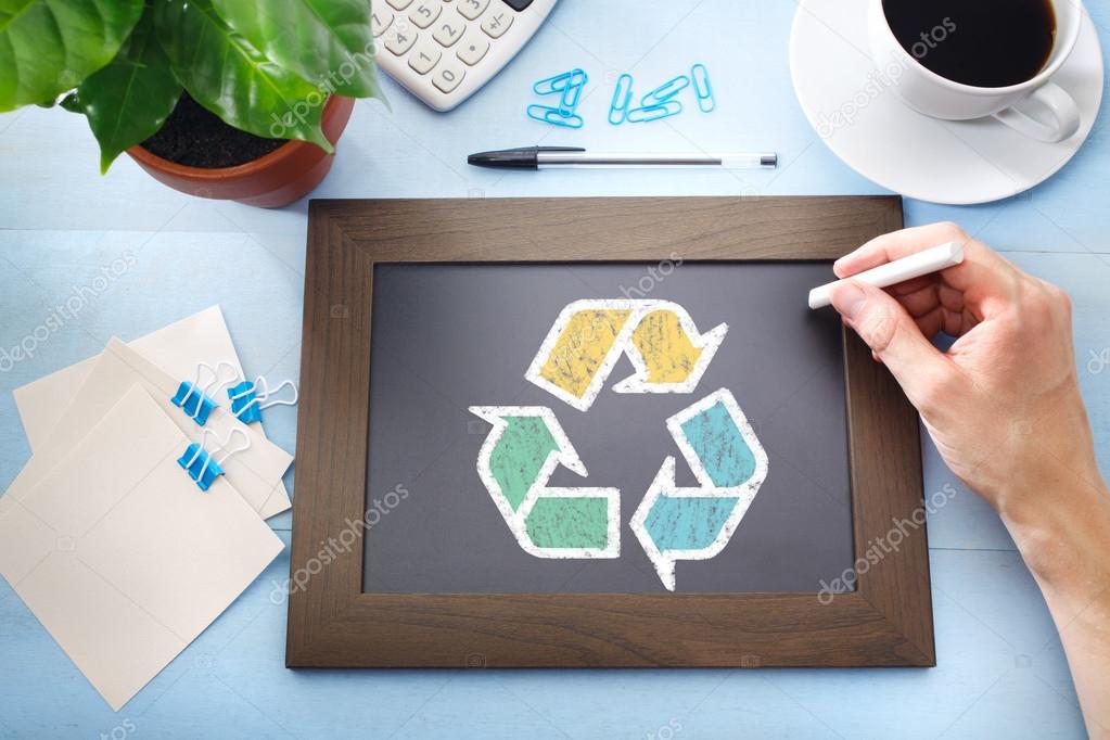 Recycle sign sketched on a little black chalkboard