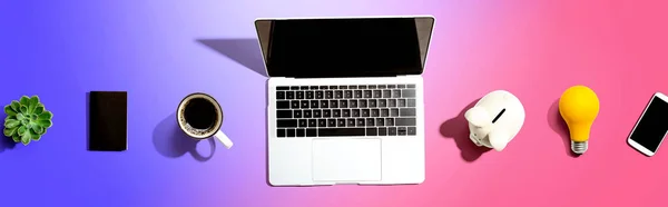Laptop computer with a piggy bank — Stock Photo, Image