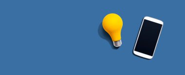 Sarı ampullü akıllı telefon.