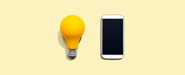 Sarı ampullü akıllı telefon.