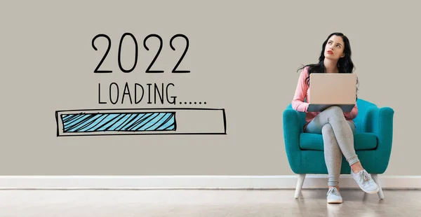 Loading new year 2022 with woman using a laptop — Stock Photo, Image