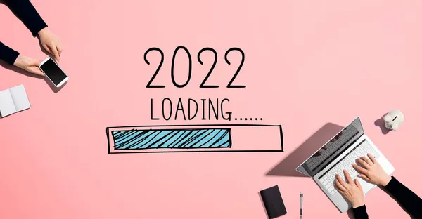 Loading new year 2022 with people working together — Stock Photo, Image