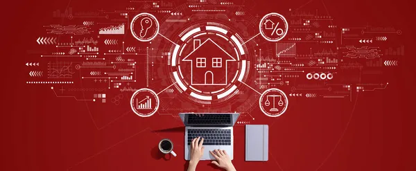 Real estate theme with person working with laptop — Stock Photo, Image