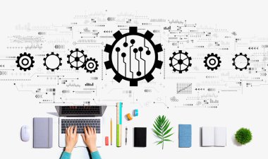 Dizüstü bilgisayar kullanan kişi ile otomasyon kavramı