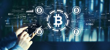 Akıllı telefon kullanan kişi ile Bitcoin temasıName