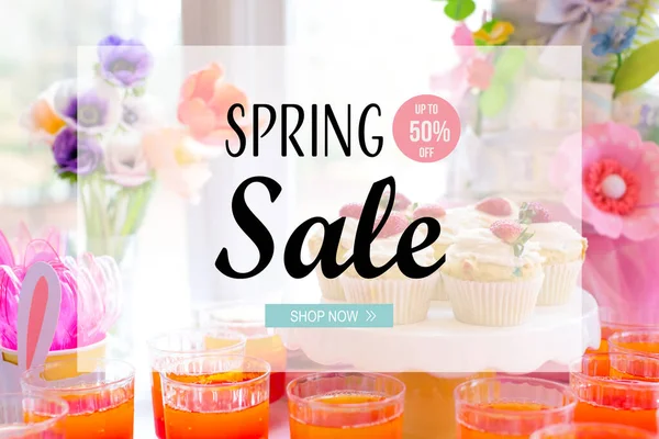 Spring sale message with dessert table — Stock Photo, Image