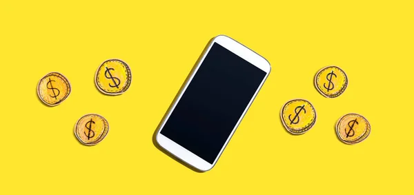Smartphone em branco com moedas - ganhar tema online — Fotografia de Stock