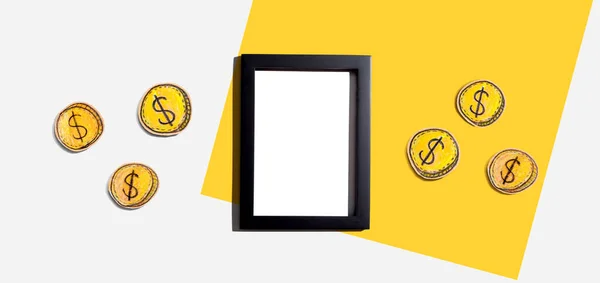 Blank photo frame with coins - earn online theme — Stock Photo, Image