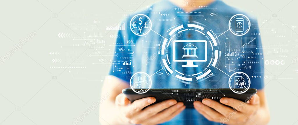 Fintech theme with man using a tablet