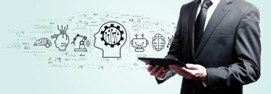 Gelecekteki teknoloji konsepti iş adamı elinde bir tablet tutuyor.