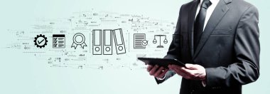 Bir tablet tutan işadamı ile uyum Tema