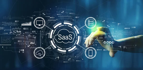 SaaS - software as a service concept with hand pressing a technology screen — Fotografia de Stock